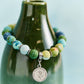 Mellow Monkey Friend bracelet with multi-colored polymer clay beads, silver spacers, and a Grateful For You charm.