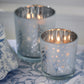 Mellow Monkey set of frosted glass tealight candleholders with winter woodland deer and tree silhouettes
