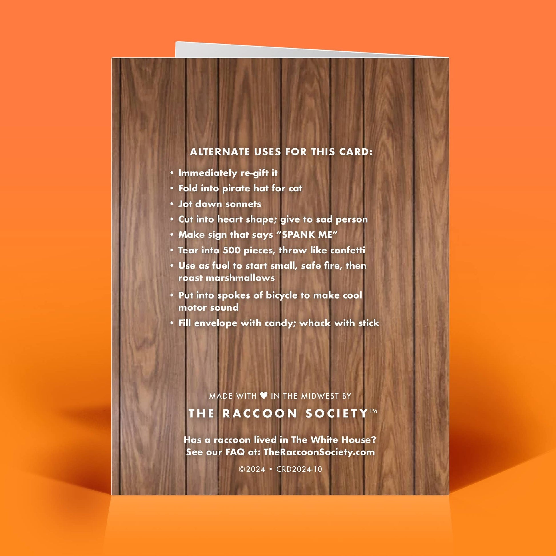 Mellow Monkey funny birthday card back featuring a humorous list of alternate uses printed on a wood grain background.