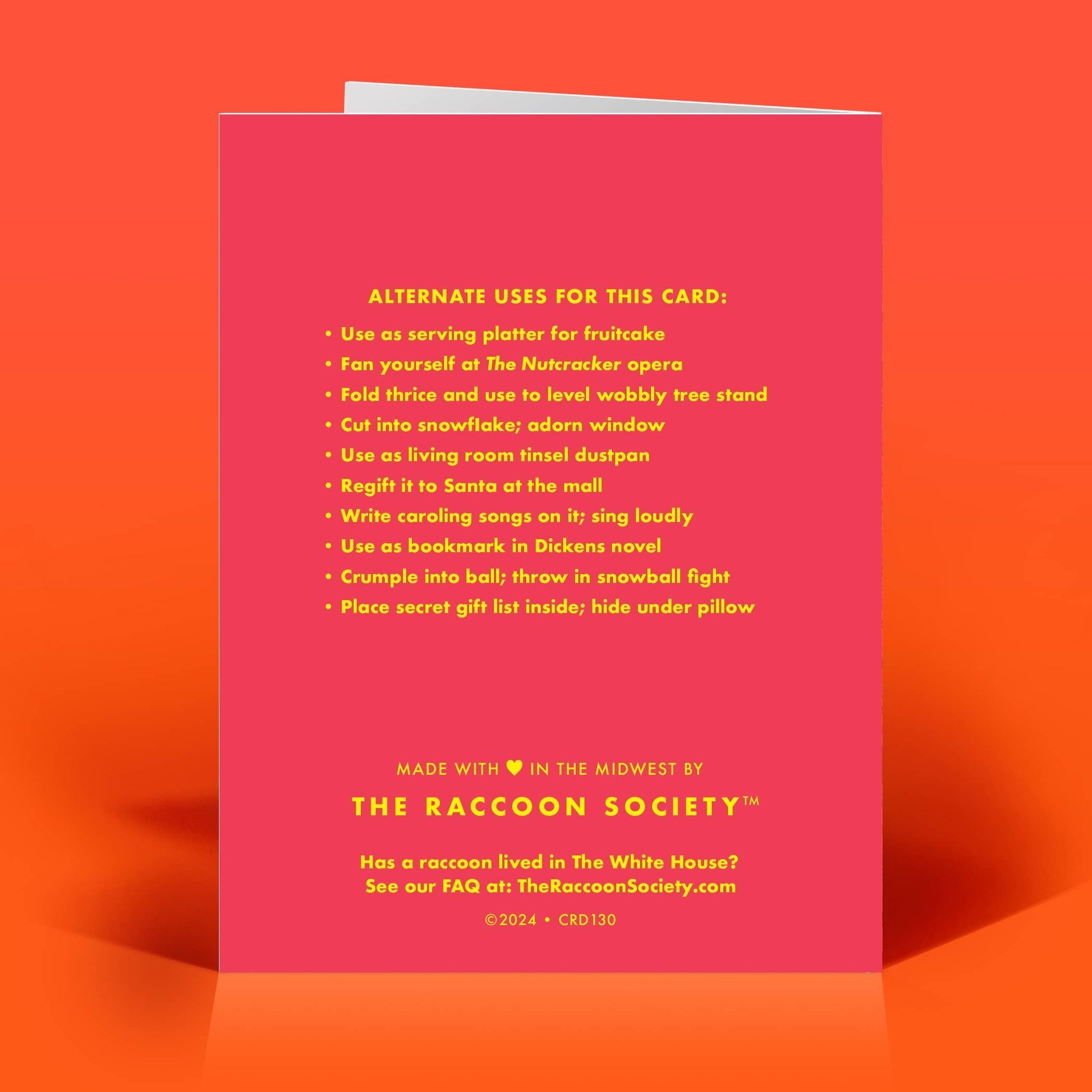 Mellow Monkey funny Christmas card back featuring humorous alternate uses for the card printed in yellow on pink