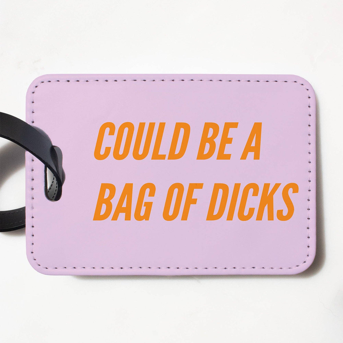 Mellow Monkey funny light purple faux leather luggage tag with orange Could Be a Bag of Dicks text and black strap