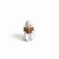 Mellow Monkey white ghost figurine reading a brown book with an illuminated LED tealight candle inside