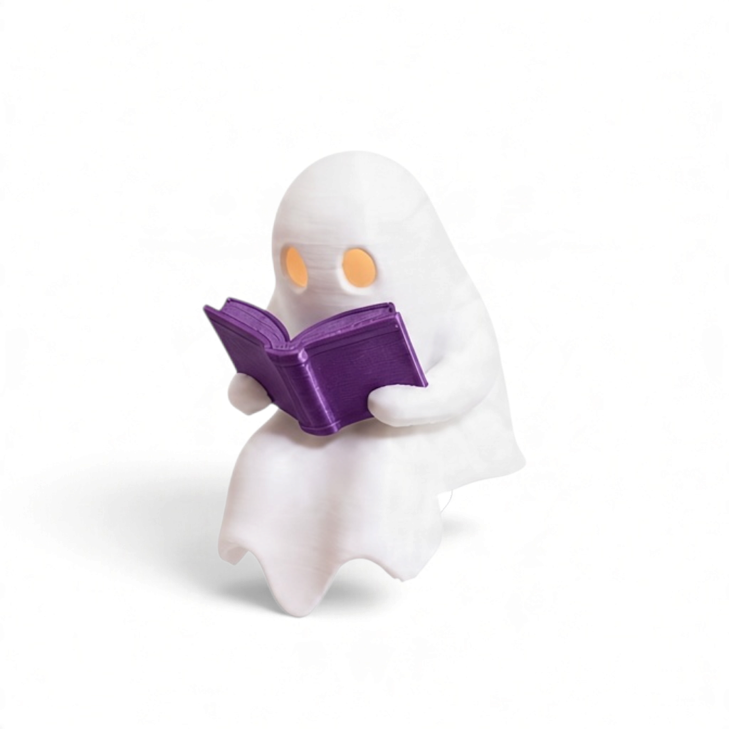 Mellow Monkey white ghost figurine reading a purple book with an integrated LED tealight candle for home decor.