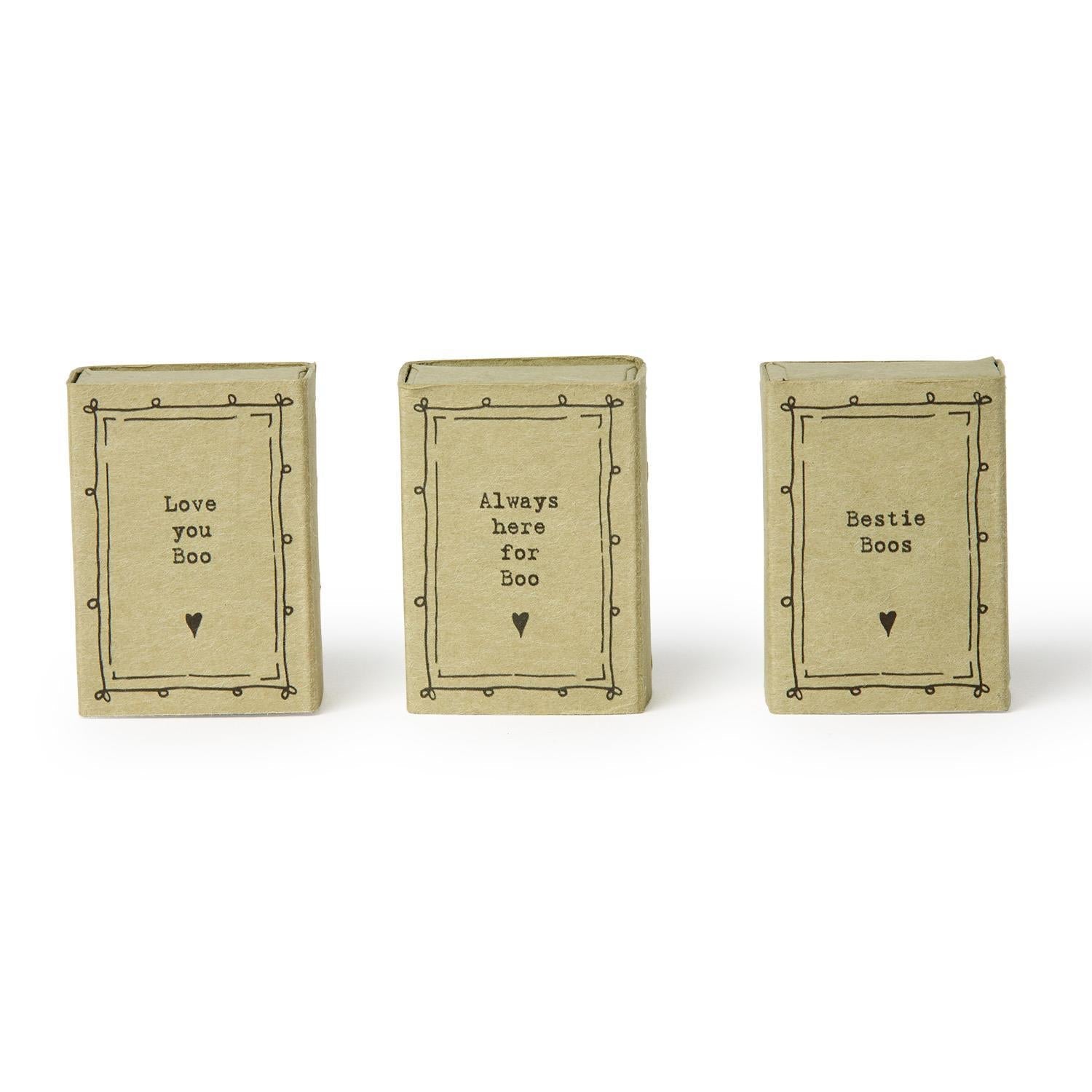 Mellow Monkey pocket-sized ghost ceramic figurines in kraft paper gift boxes with whimsical messages