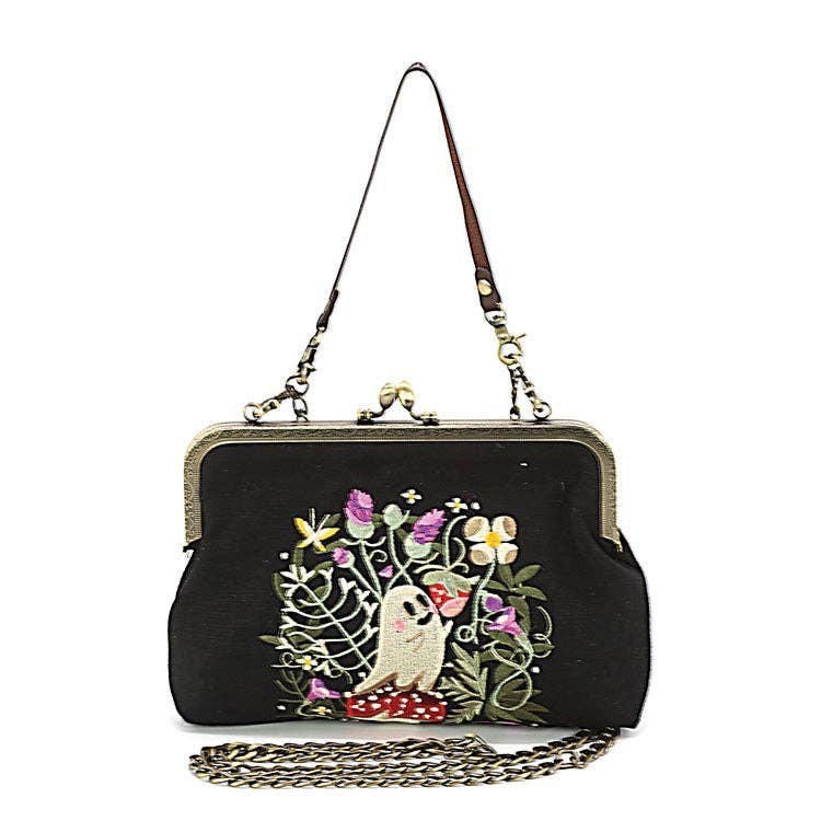 Mellow Monkey black linen blend kisslock handbag featuring embroidered ghost and strawberry field design.