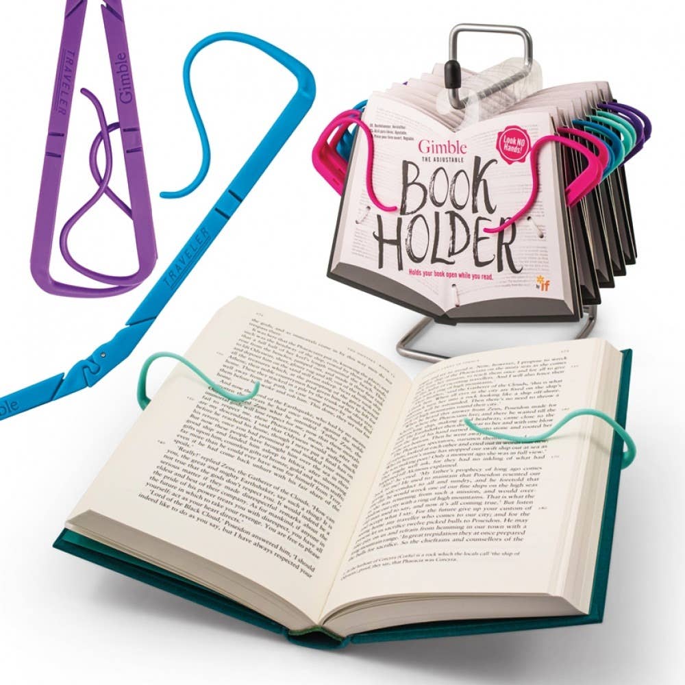 Mellow Monkey Gimble adjustable purple book holder keeping a paperback open for hands-free reading on a desk