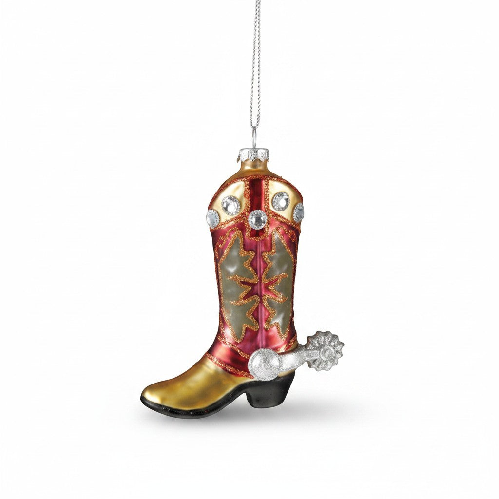 Mellow Monkey hand-painted glass cowboy boot ornament in red and gold with glitter, jewels, and a silver spur.