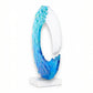 Mellow Monkey handmade 13-inch fused glass ocean wave sculpture with blue and white coastal tones on a marble base.