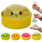 Mellow Monkey rainbow glitter dumpling squeeze toy with cute face in yellow steamer basket for stress relief.