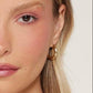 Mellow Monkey gold plated bamboo hoop earrings with organic texture and sterling silver posts.