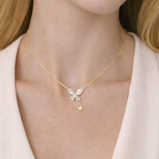 Mellow Monkey 18k gold vermeil necklace with a crystal butterfly pendant and a small gold butterfly charm.