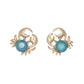 Mellow Monkey gold crab stud earrings featuring round aqua crystals for a coastal beachy style.