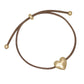 Mellow Monkey gold heart charm bracelet on a brown braided cord, nickel and lead-free coastal jewelry.