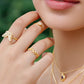 Mellow Monkey 18k gold vermeil adjustable ring with cubic zirconia stones in a delicate leaf design.
