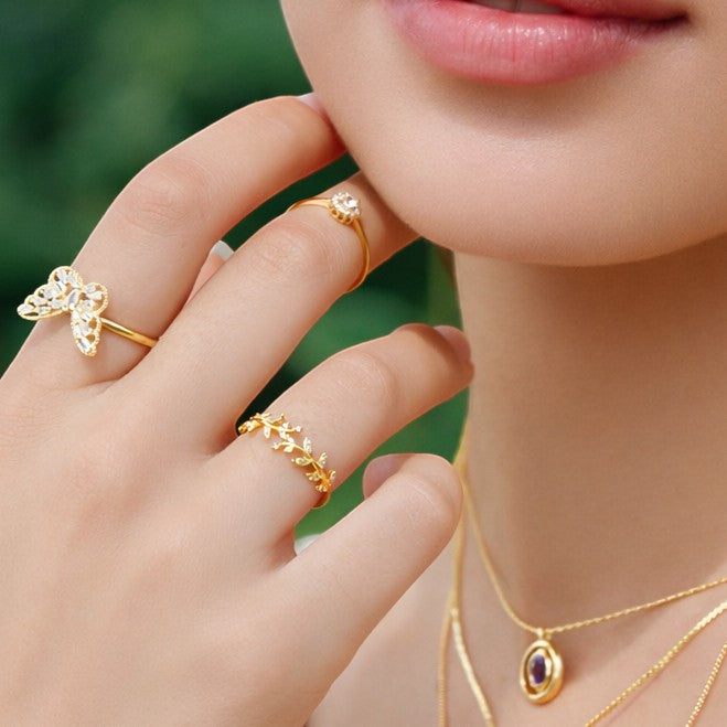 Mellow Monkey 18k gold vermeil adjustable ring with cubic zirconia stones in a delicate leaf design.