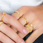 Mellow Monkey 18k gold vermeil adjustable ring with cubic zirconia stones in a delicate leaf design.