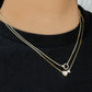 Mellow Monkey 18k gold plated necklace with cubic zirconia circle and heart pendant. Delicate chain.