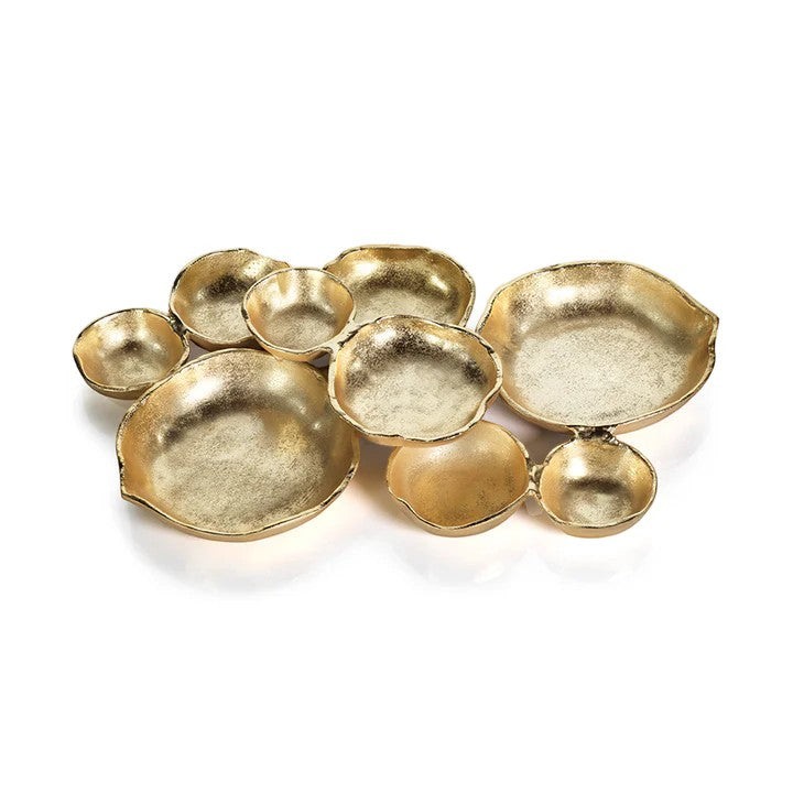 Mellow Monkey gold-plated alloy serving tray with nine connected bowls for snacks and dips, 19-inch wide.