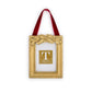 Mellow Monkey rectangular gold holly leaf photo frame ornament with a festive red velvet hanging ribbon