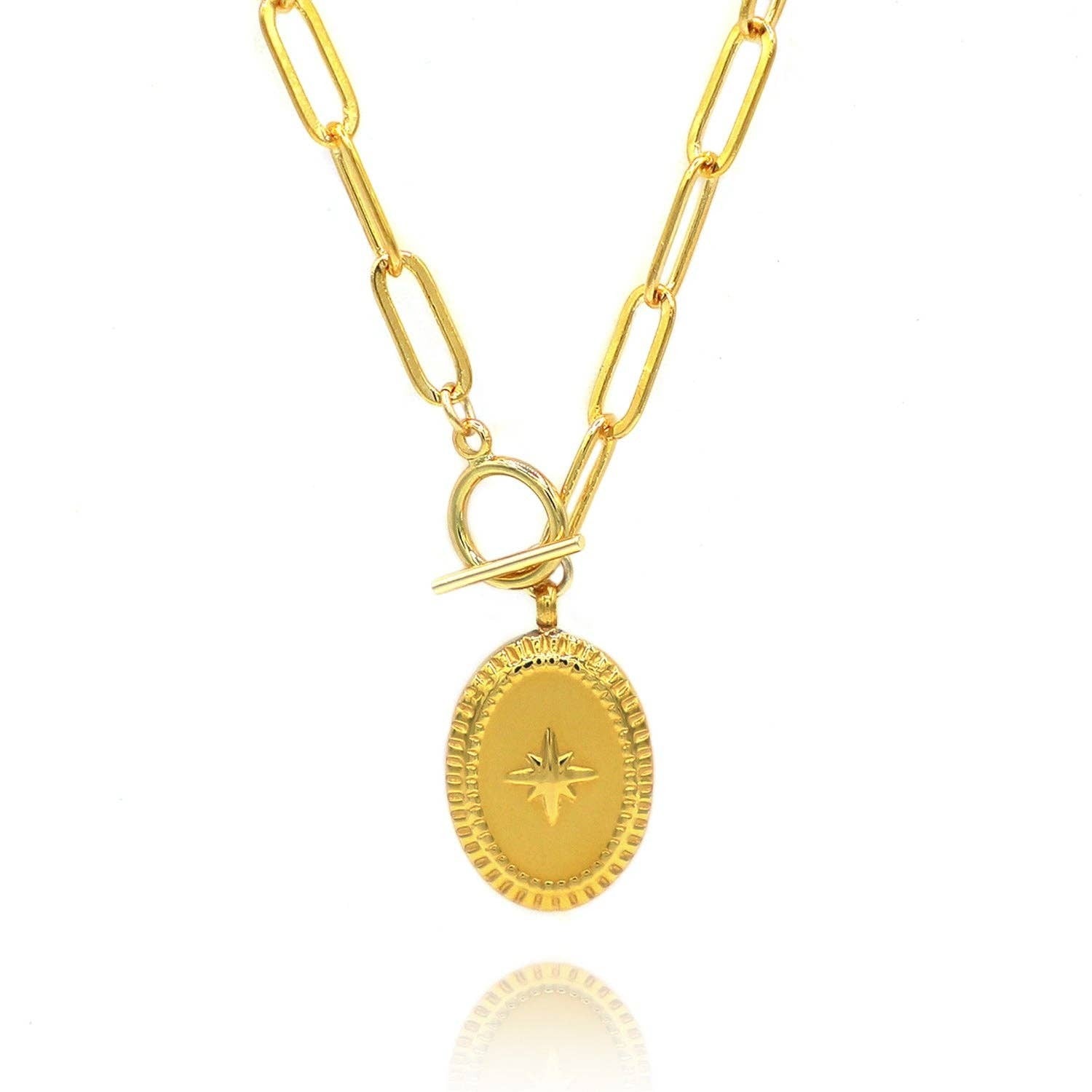 Mellow Monkey 18k gold plated oval starburst pendant necklace with toggle clasp and cubic zirconia detail.