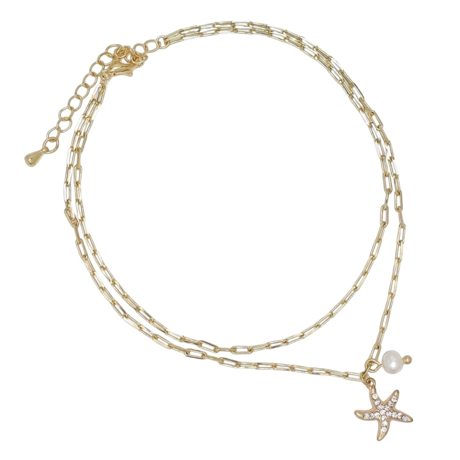Mellow Monkey gold chain anklet featuring a crystal-encrusted starfish charm and a small white pearl accent.