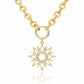 Mellow Monkey gold plated sun pendant necklace with cubic zirconia and white enamel details on a chunky chain.
