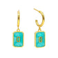 Mellow Monkey 18k gold plated hoop earrings with rectangular teal enamel and a small green cubic zirconia accent.