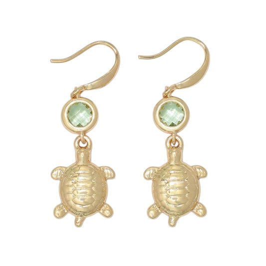 Mellow Monkey gold turtle drop earrings featuring a round green crystal accent, nickel-free coastal jewelry.