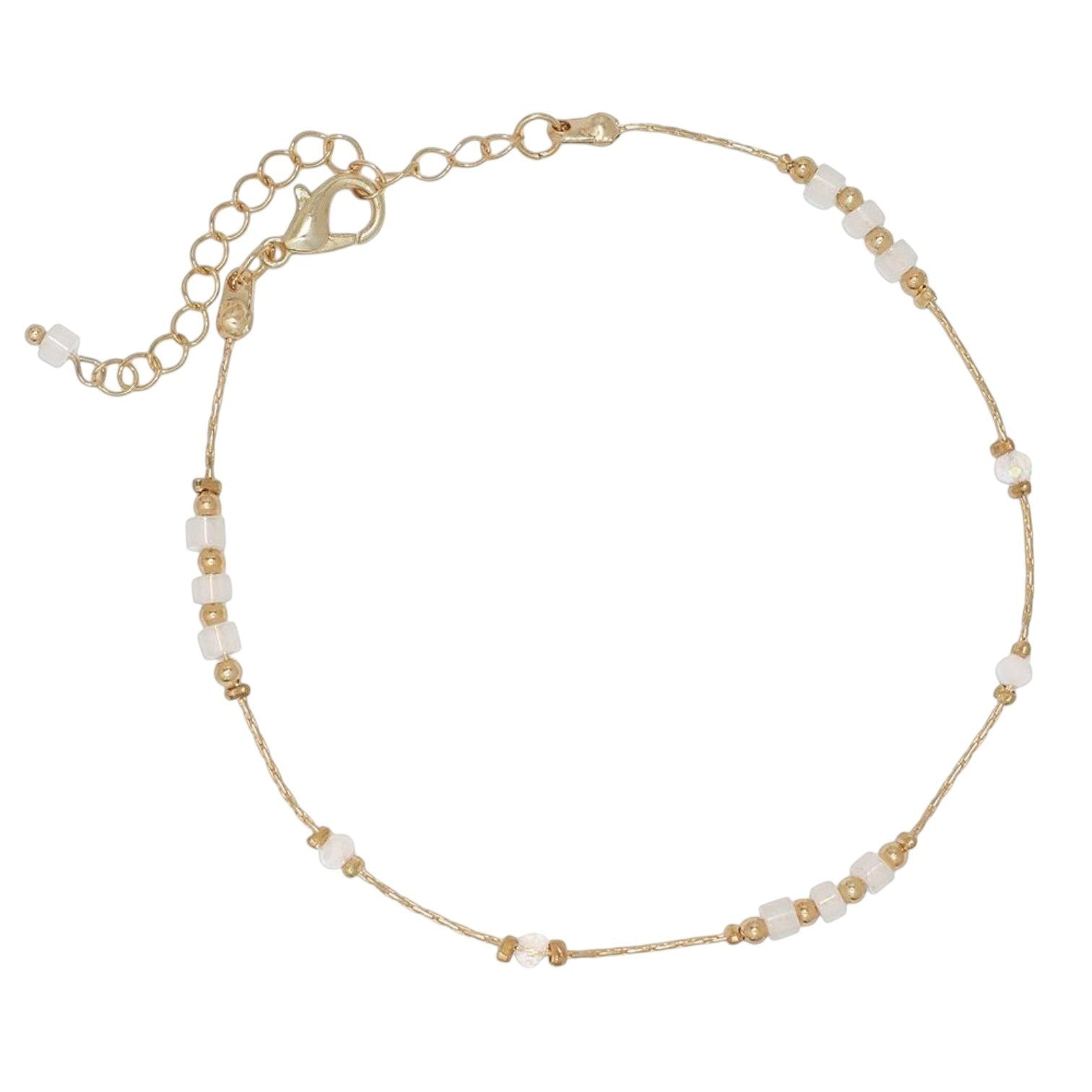 Mellow Monkey gold anklet with delicate white beads, featuring a lobster clasp and adjustable chain.
