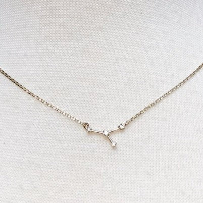 Mellow Monkey gold zodiac constellation necklace with cubic zirconia accents, 16-inch length.