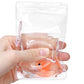 Mellow Monkey squishy goldfish toy inside a clear gel-filled ziplock bag with a pink keyring for stress relief