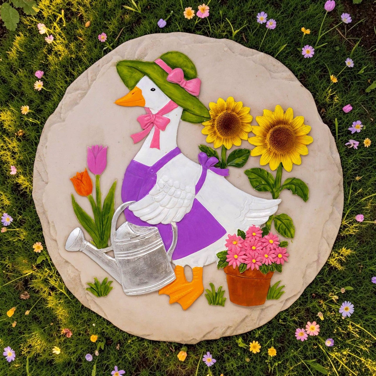 Mellow Monkey round garden stepping stone featuring a goose in a hat and apron with sunflowers and a watering can.