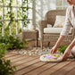 Mellow Monkey garden goose stepping stone with floral design on a wooden deck, suitable for wall or ground display.