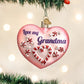 Mellow Monkey pink heart-shaped glass ornament with "Love my Grandma" text and candy cane details.