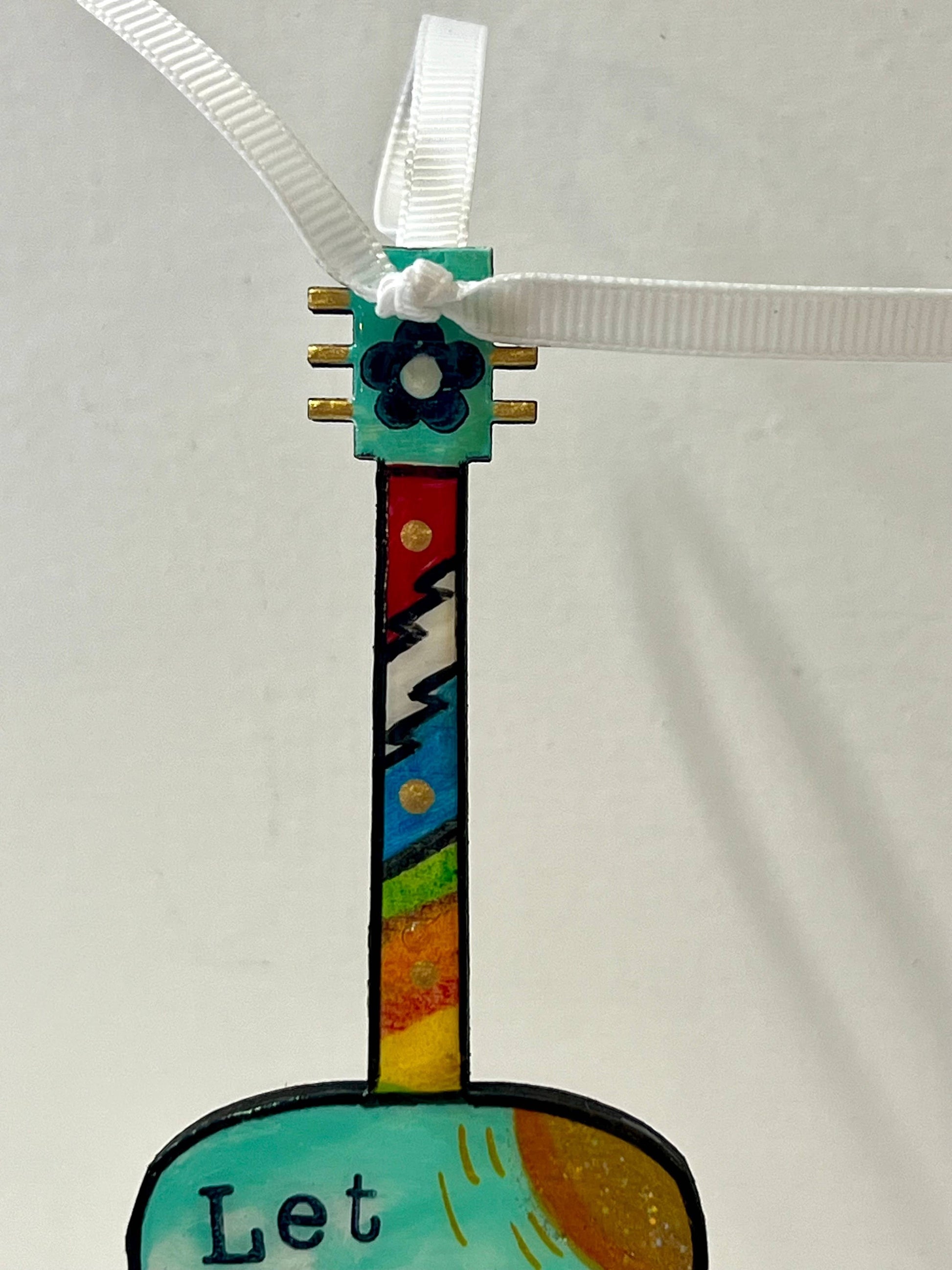 Mellow Monkey Grateful Dead hand-painted wooden guitar ornament with colorful neck and white ribbon hanger