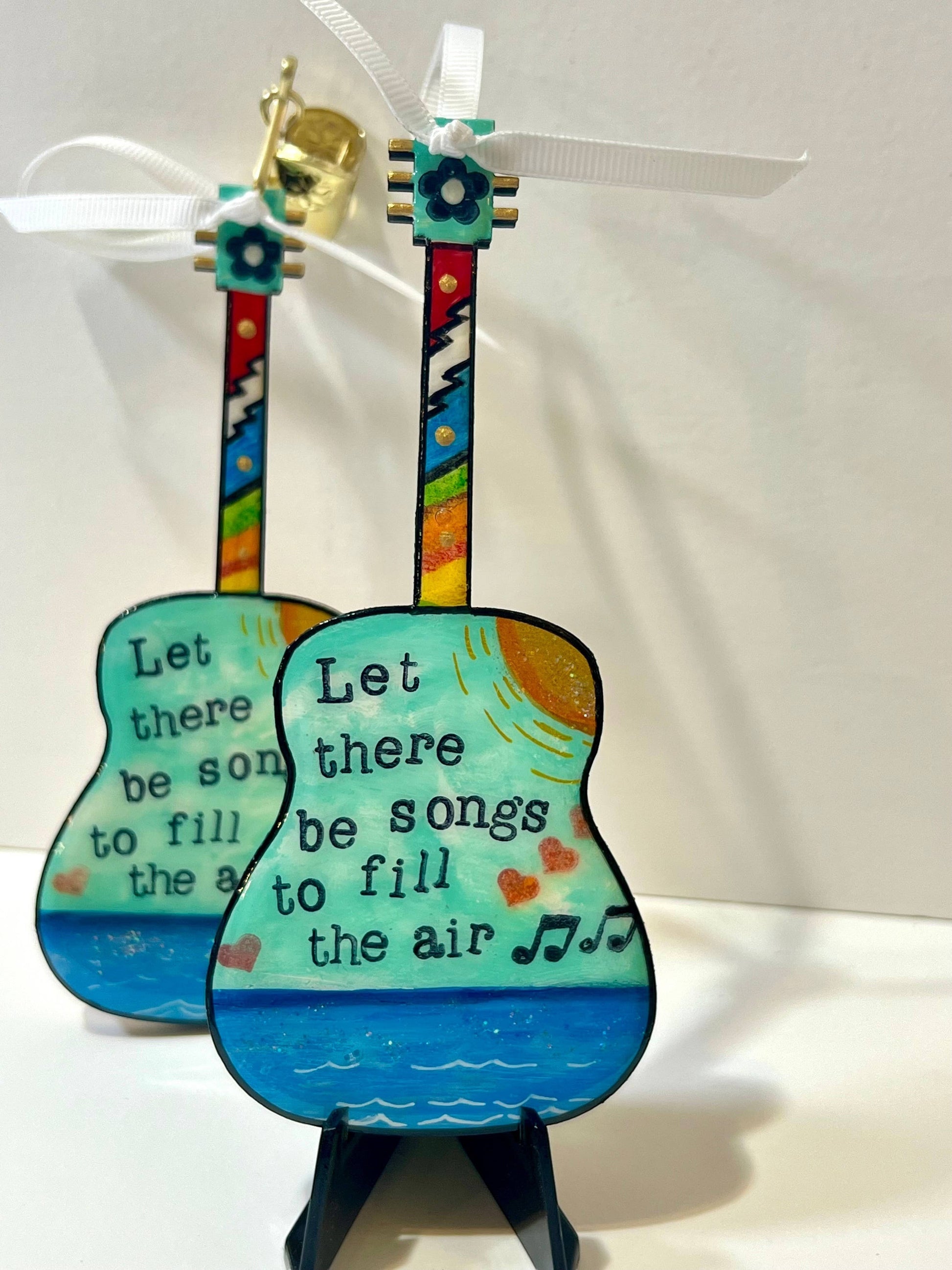 Mellow Monkey hand-painted wooden Grateful Dead guitar ornament with lyrics and ribbon loop on a mini easel
