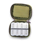 Mellow Monkey green canvas travel pill case with 8 compartments for daily vitamins and medication. Includes exterior pocket.