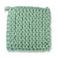 Mellow Monkey green crocheted cotton pot holder, 8-inch square, with a hanging loop.