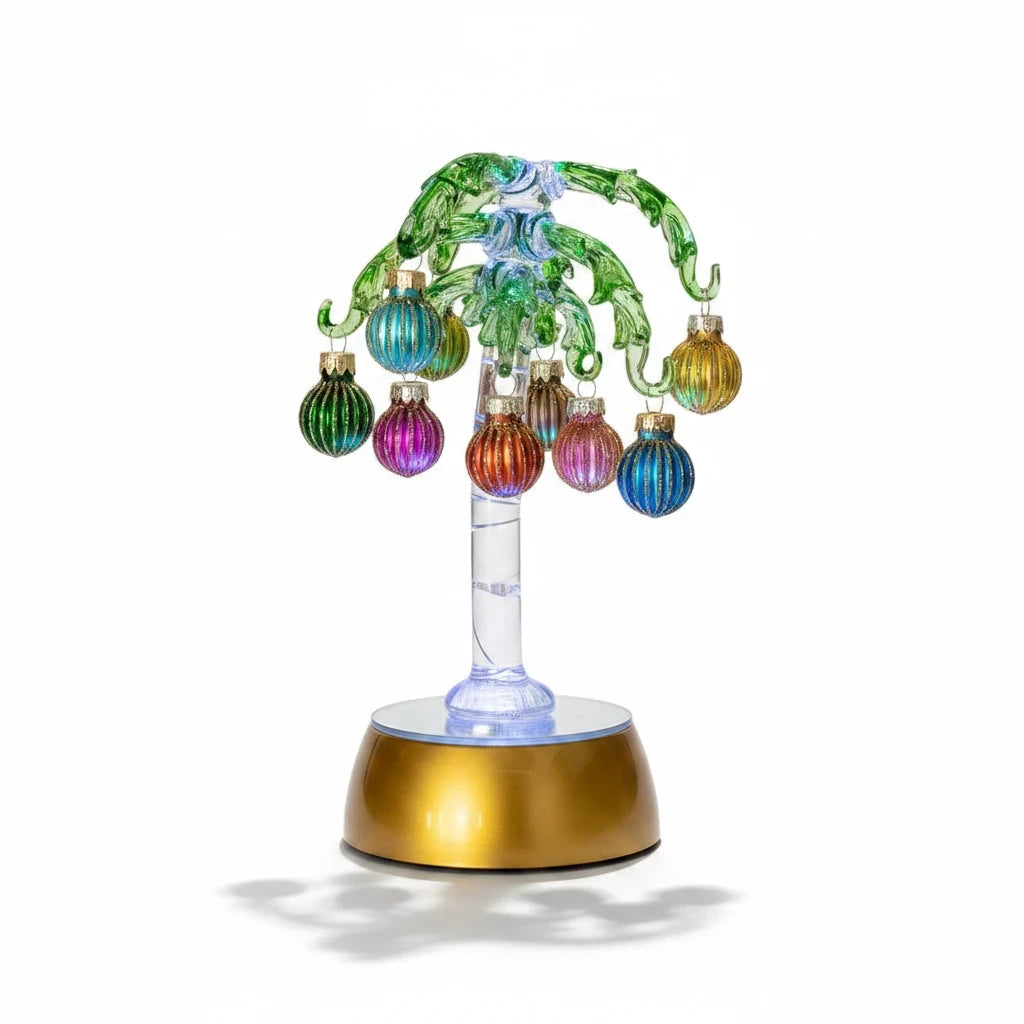 Mellow Monkey 9-inch green glass palm tree holiday decoration with colorful mini ornaments and base lighting