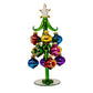 Mellow Monkey 8-inch green glass Christmas tree decorated with colorful vintage-style teardrop ornaments and a star.