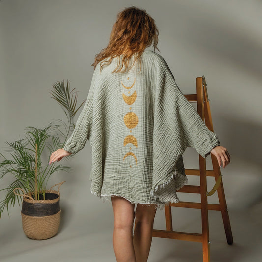 Mellow Monkey green 4-layer muslin kimono robe with gold moon phases design on back, frayed hem.