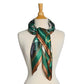 Mellow Monkey green tartan silky scarf with gold chain print draped on a mannequin