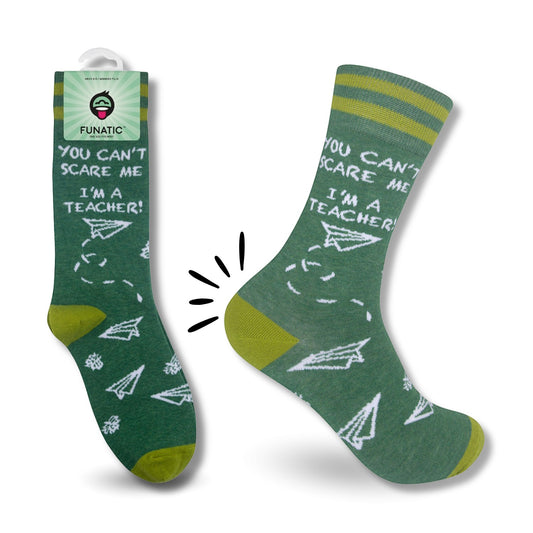 Mellow Monkey green novelty socks with paper airplane print and the text You Can't Scare Me I'm A Teacher