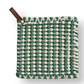 Mellow Monkey square crocheted pot holder in green and white with a brown leather hanging loop.