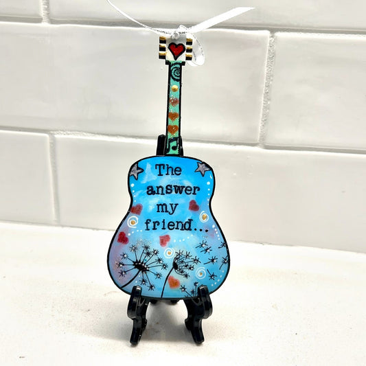 Mellow Monkey Blowing In The Wind guitar ornament with blue hand-painted dandelion and lyric design.