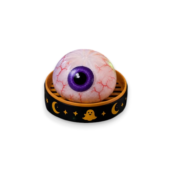 Mellow Monkey Halloween mystery squishy dumpling featuring a realistic eyeball design in a decorative steamer basket