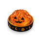 Mellow Monkey Halloween mystery squishy dumpling toy in a black steamer basket with pumpkin face design