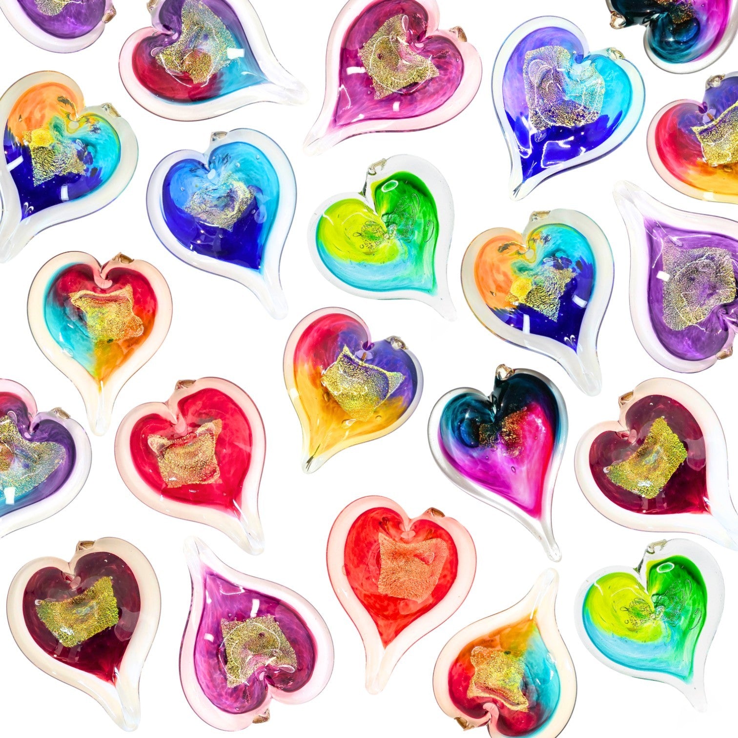 Mellow Monkey collection of colorful hand-blown glass heart ornaments with gold leaf accents on a white background.