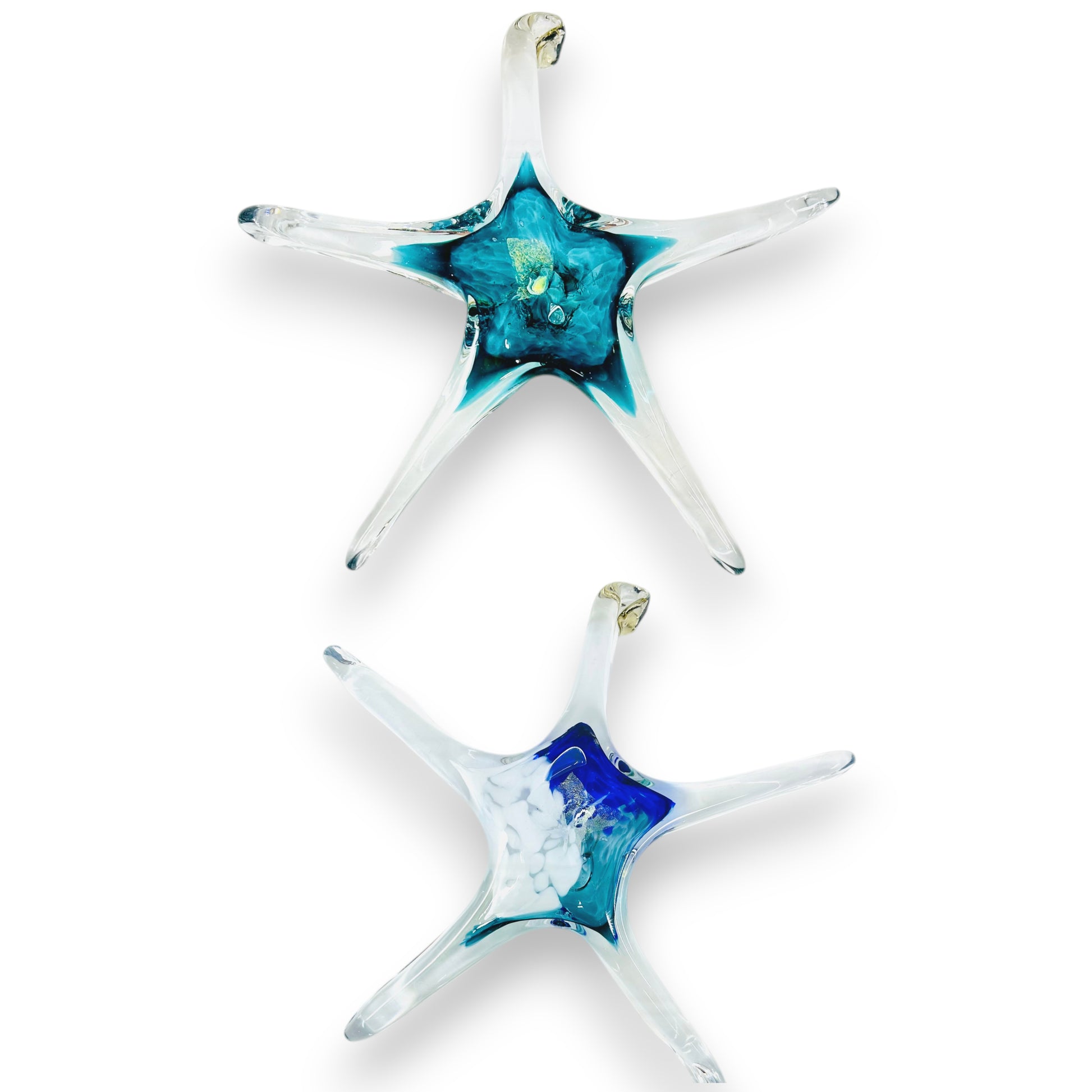 Two Mellow Monkey hand-blown glass stars in blue and clear glass with hanging loops for window decor.