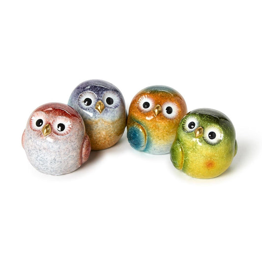 Mellow Monkey hand-painted resin owl figurines in assorted colors: red, blue, green, and orange. Small, decorative owls with big eyes and gold beaks.